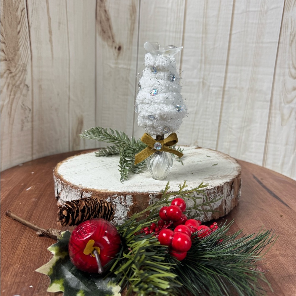 Unique White  Christmas Tree,the base is an empty perfume bottle with lights